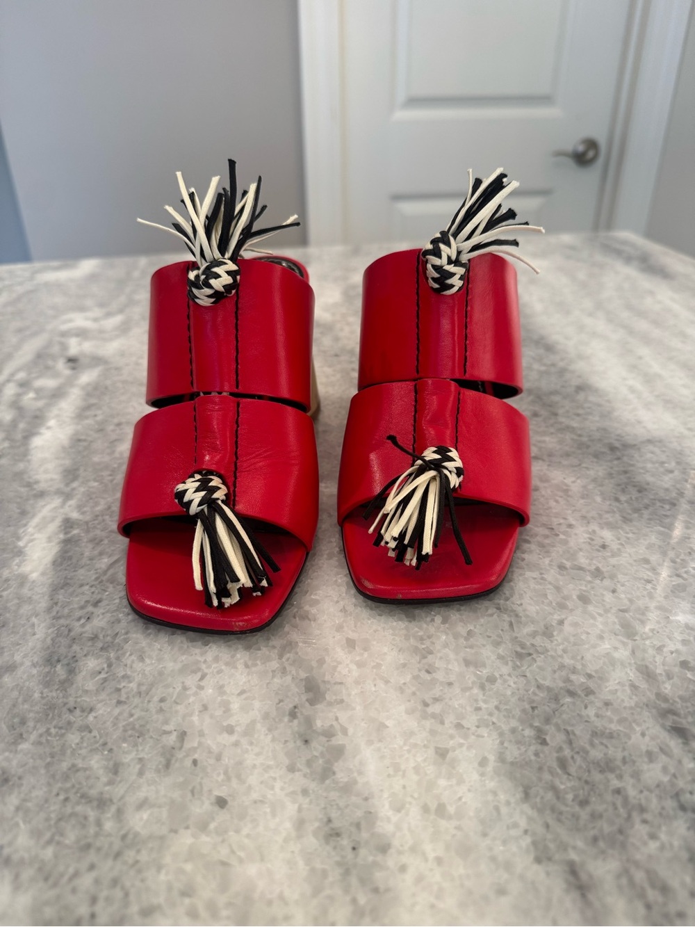 Proenza Schouler Red Double-Band Slide Sandals with Black Insole and tassles.